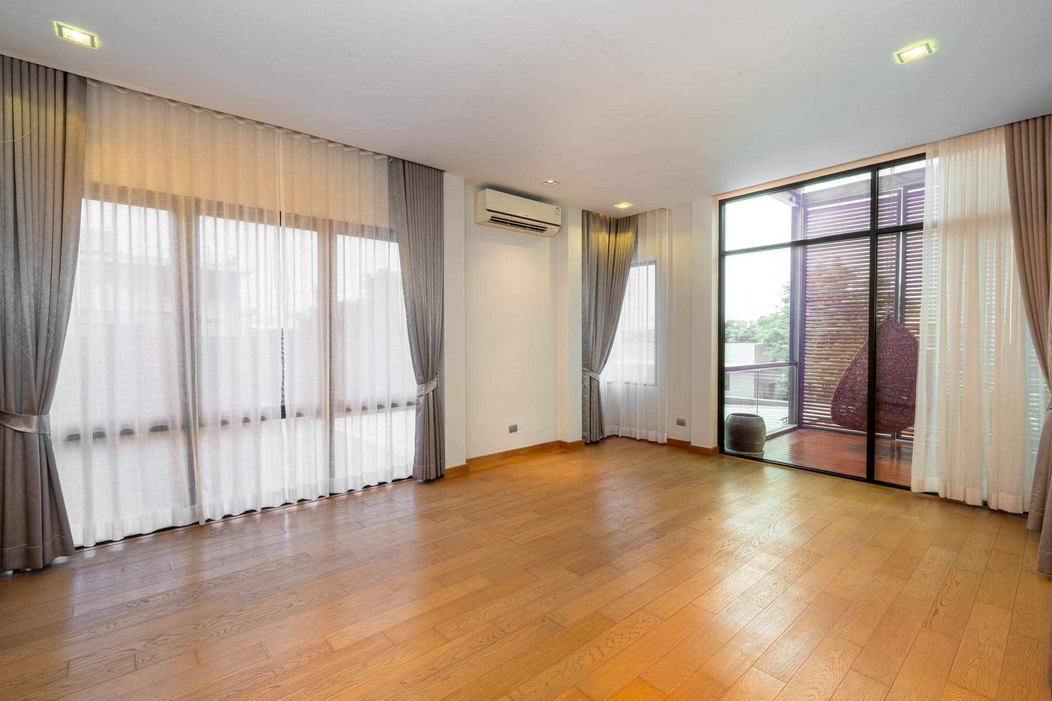 Bedroom with large windows