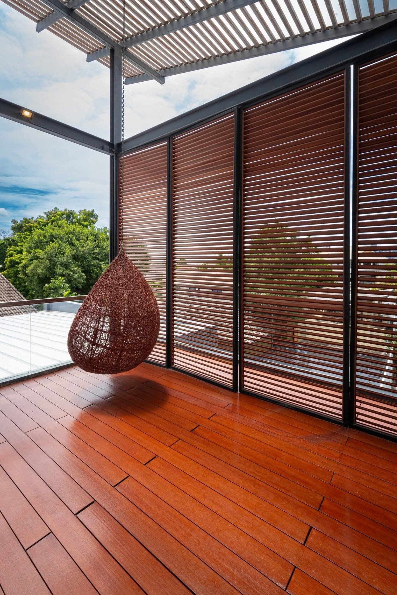 Rooftop deck with hanging chair
