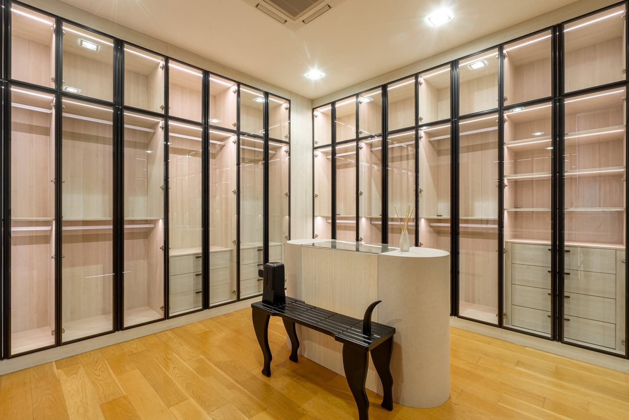Walk-in wardrobe with glass storage